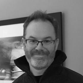 Black and white photo of Jason Pamental